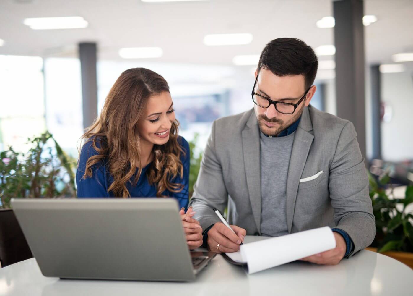 Colleagues checking ServiceNow's Partner Program